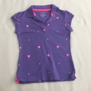 Purple shirt with pink hearts