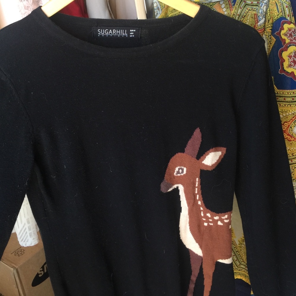 Black sweater with dear