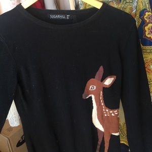 Black sweater with dear