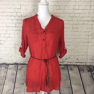 Red tunic with brown belt