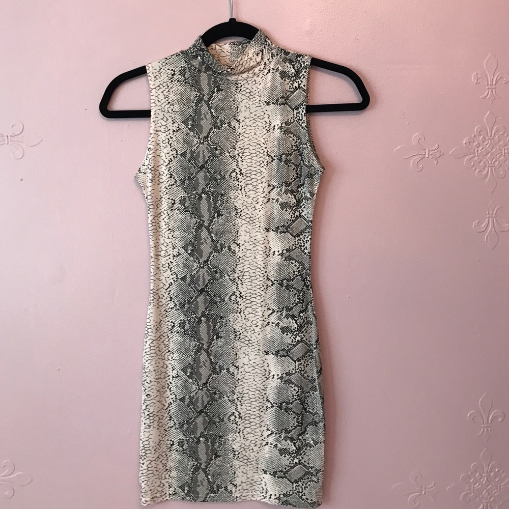 Pink snake pattern body con dress