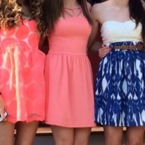 Coral dress with cutouts