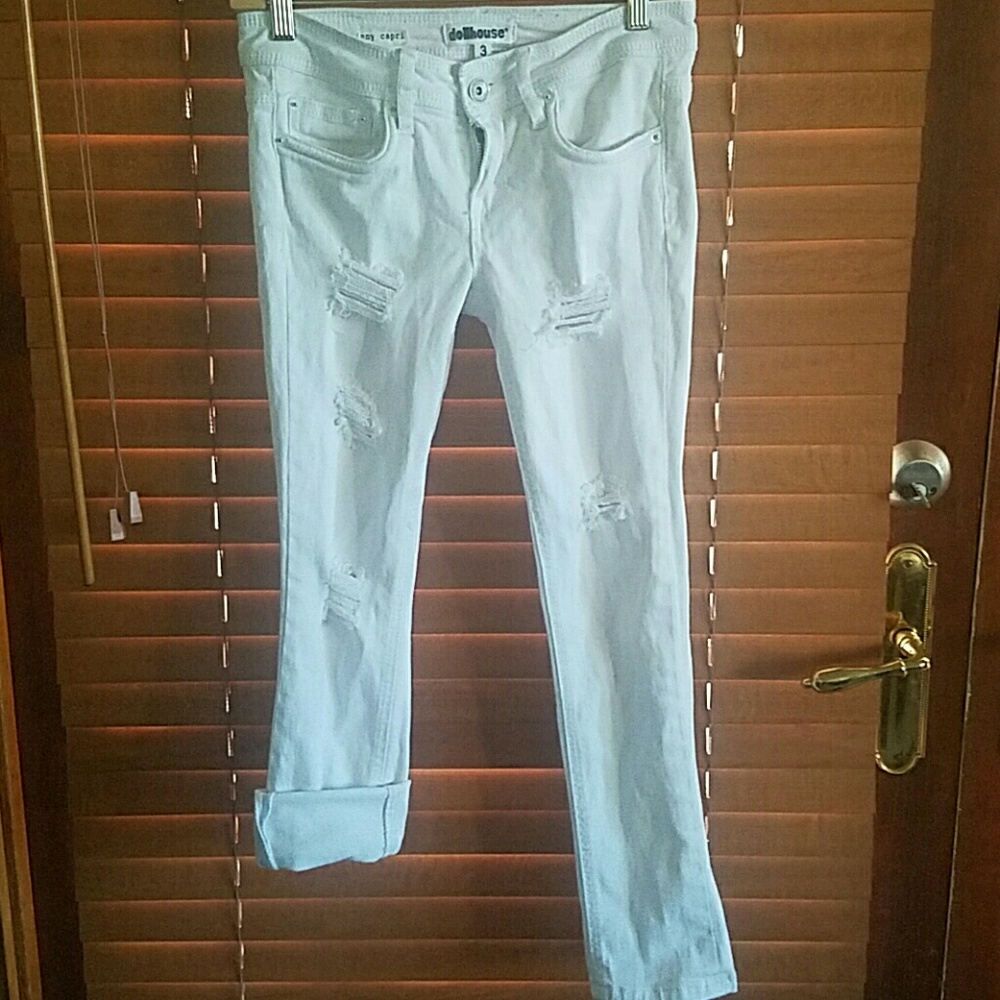 Distressed white jeans