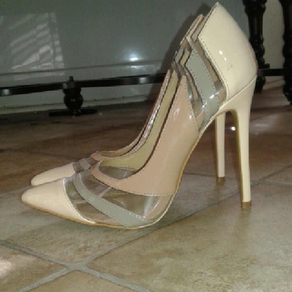 Pointed toe nude and lucite pumps