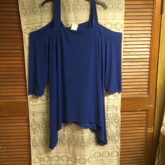 Tops - Never worn Shark tail blouse