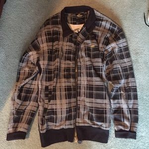 Akademiks black and grey zip up jacket.