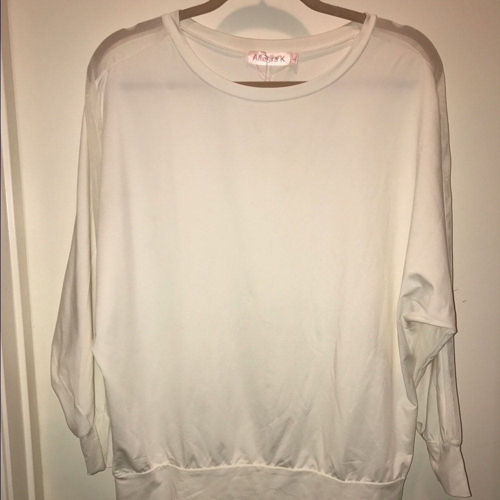 White long sleeve blouse with sheer sleeve cutout