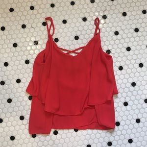 red crop top w peplum, criss cross in the back