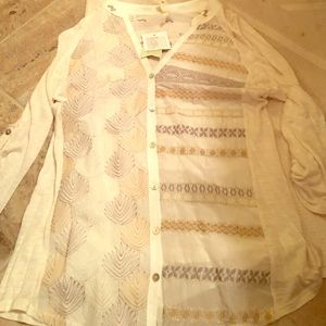 Button up top with lots of fun detail on front