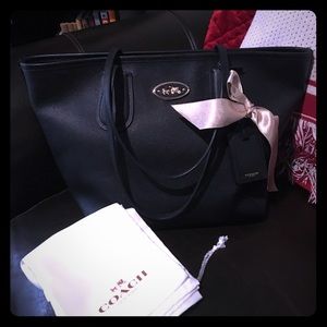 Coach tote from Von Maur. No wear, no stains,
