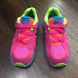 Neon pink New Balance sneakers
