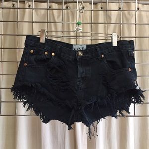 Black distressed jean shorts