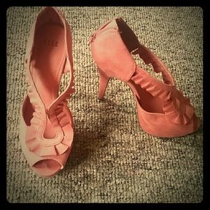 High heeled coral shoes