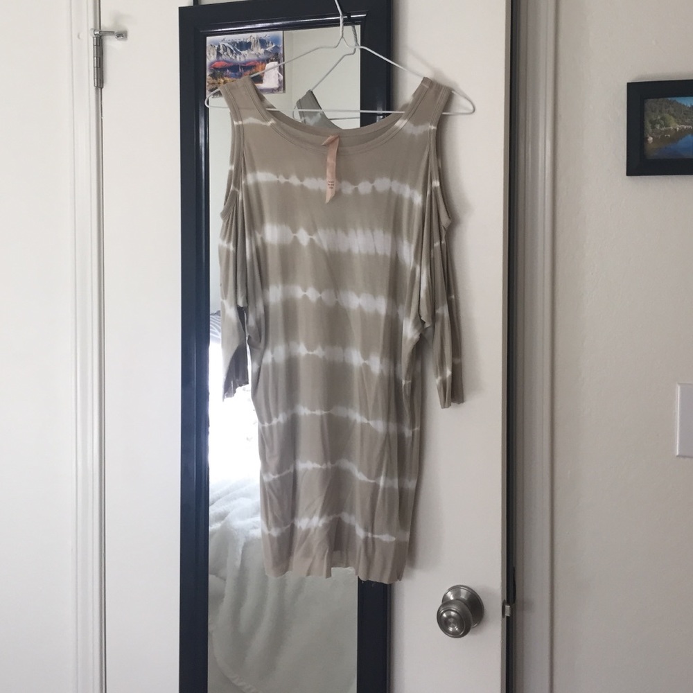 Shoulder revealing shirt