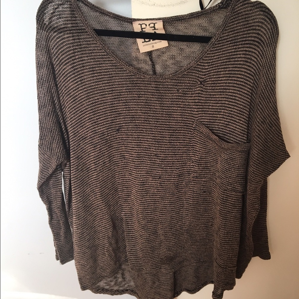 Worn, has some pulls that were sewed- cute w. tank