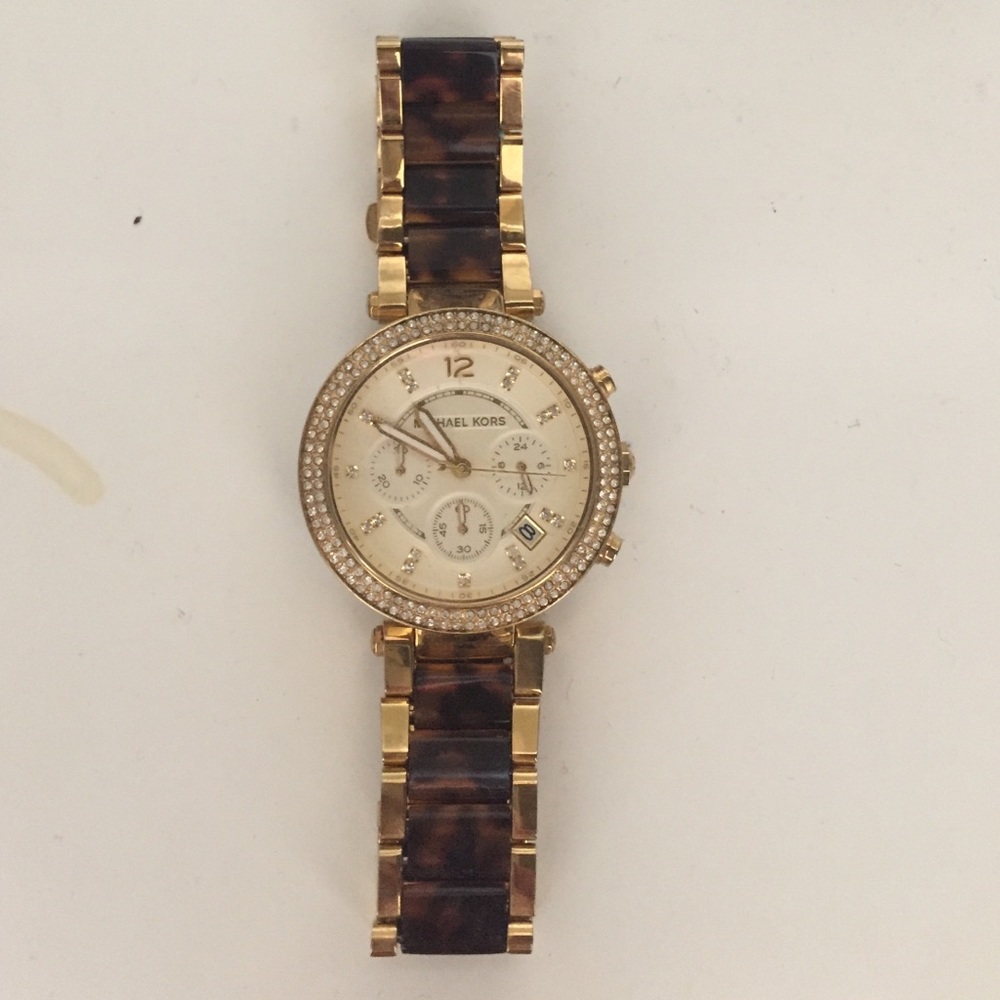 Gold and tortoise shell watch