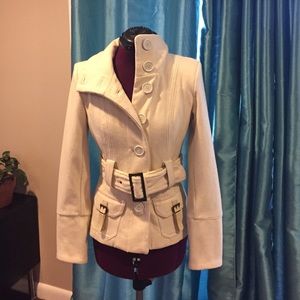 Off-white cream jacket with buttons and belt.