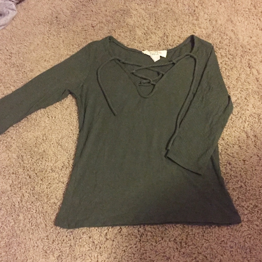 Army green. Medium but fits like a small