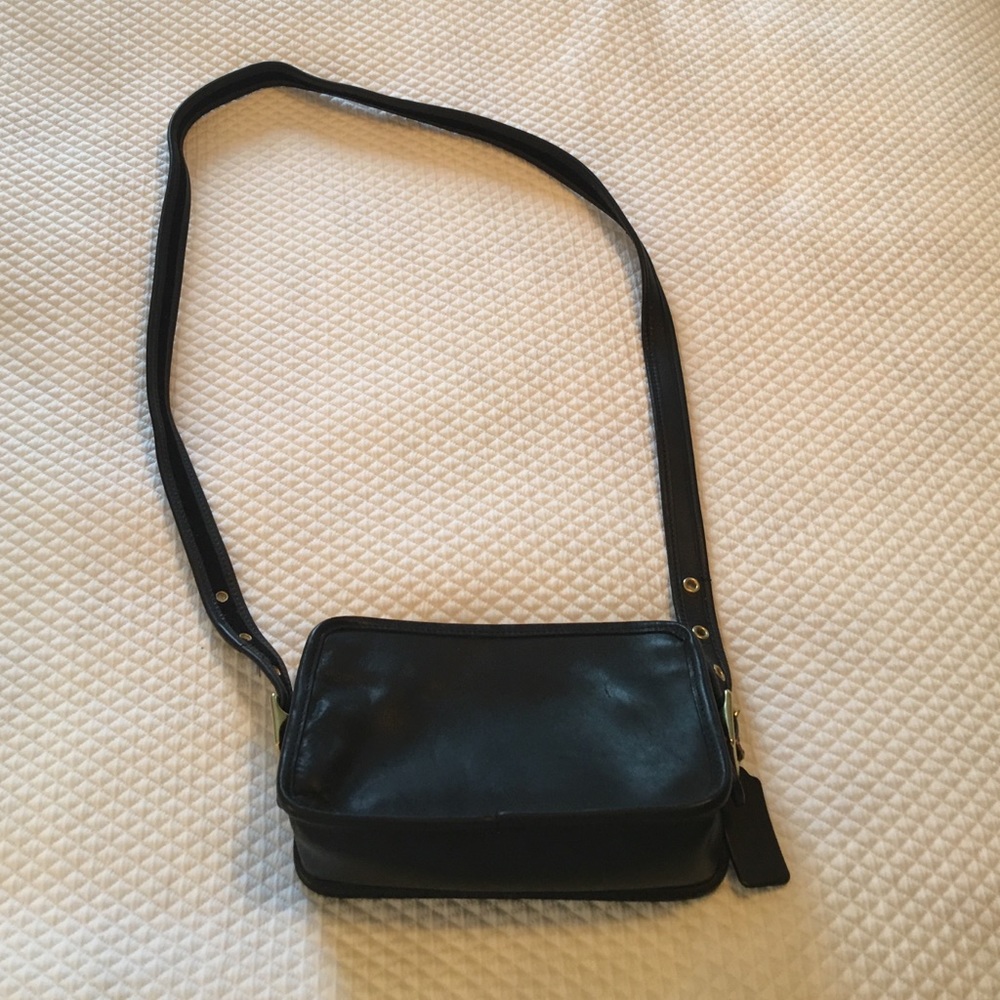 COACH black leather crossbody purse.