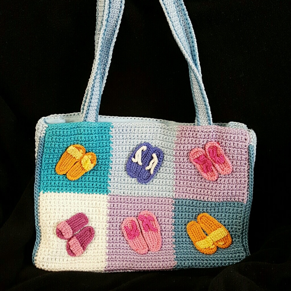 The Sak baby blue hued sandal front bag