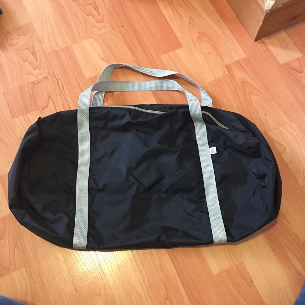Free w/ $15 purchase - Small black duffle bag