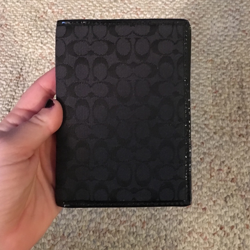 Black coach passport case