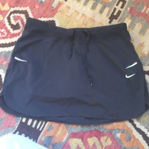 TRADE NIKE TENNIS SKIRT WITH BUILT IN SPANDEX