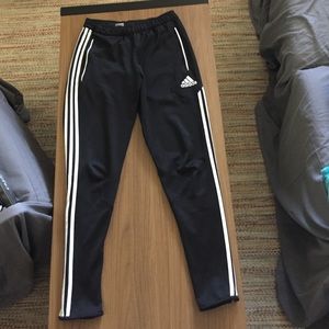 Adidas track pants.