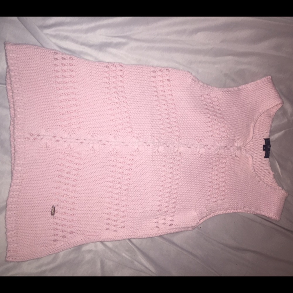 A pink sweater material tank top