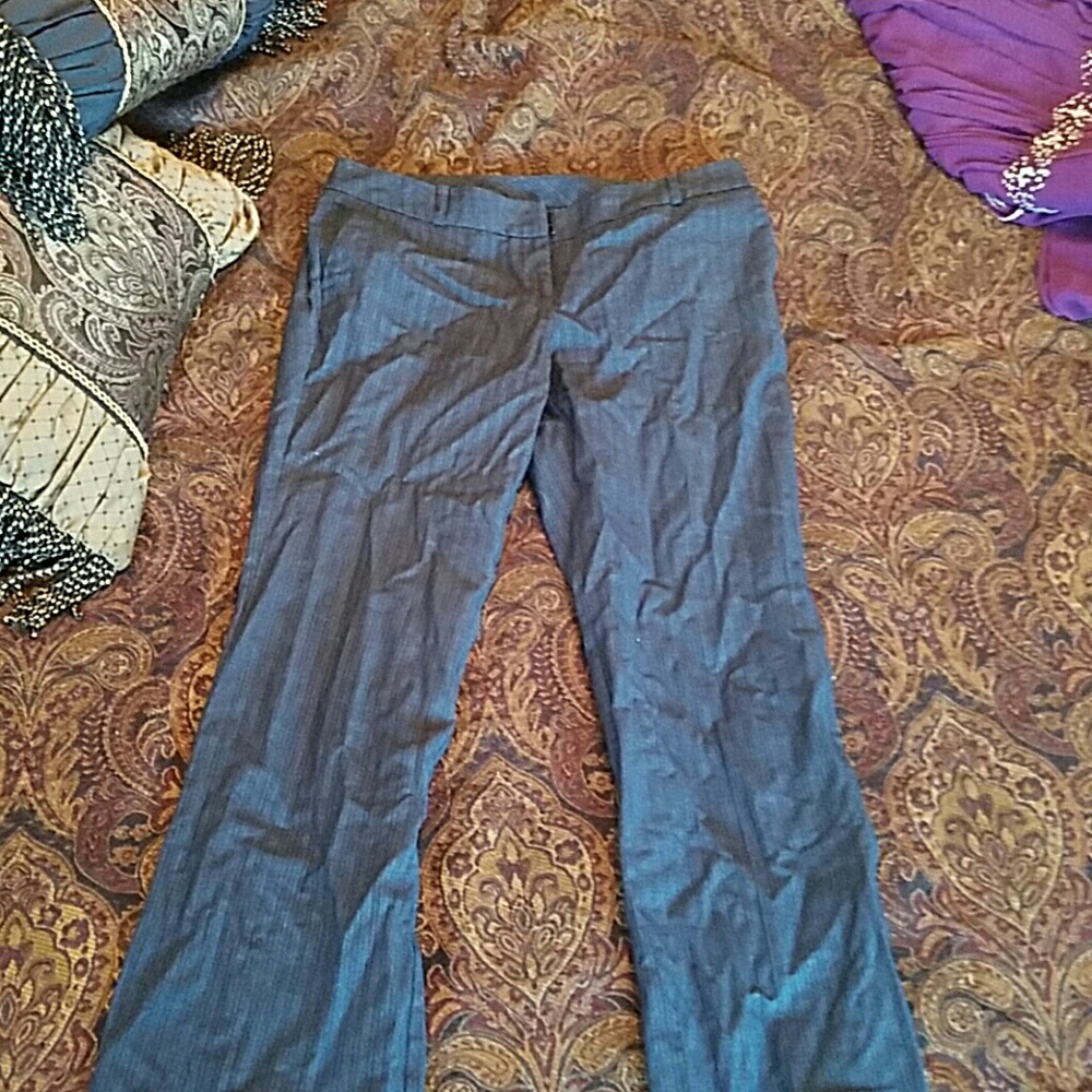 Black work pants with blue and silver stripes