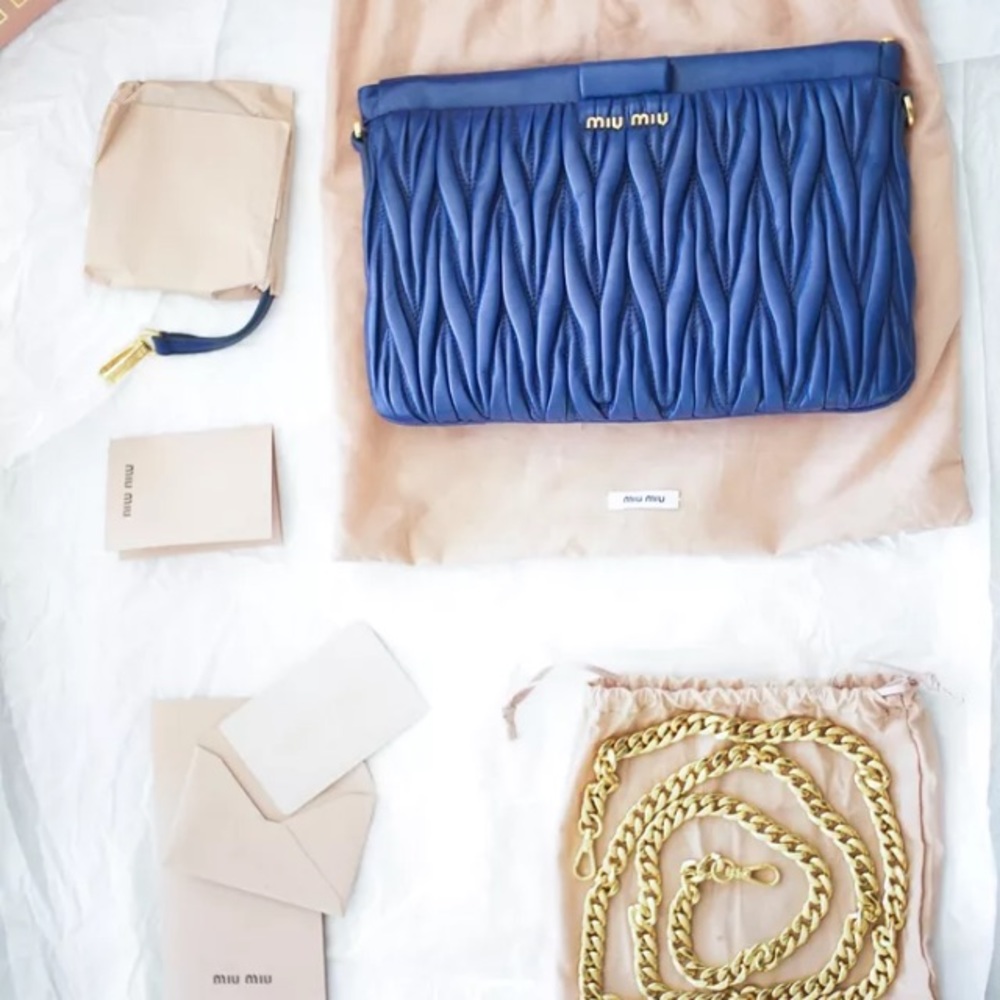 Like new Miu Miu Blue Leather Clutch w Gold Chain