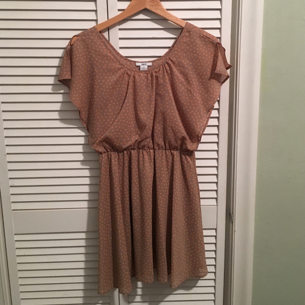 Peach poka-dot dress.