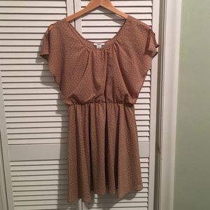 Peach poka-dot dress.