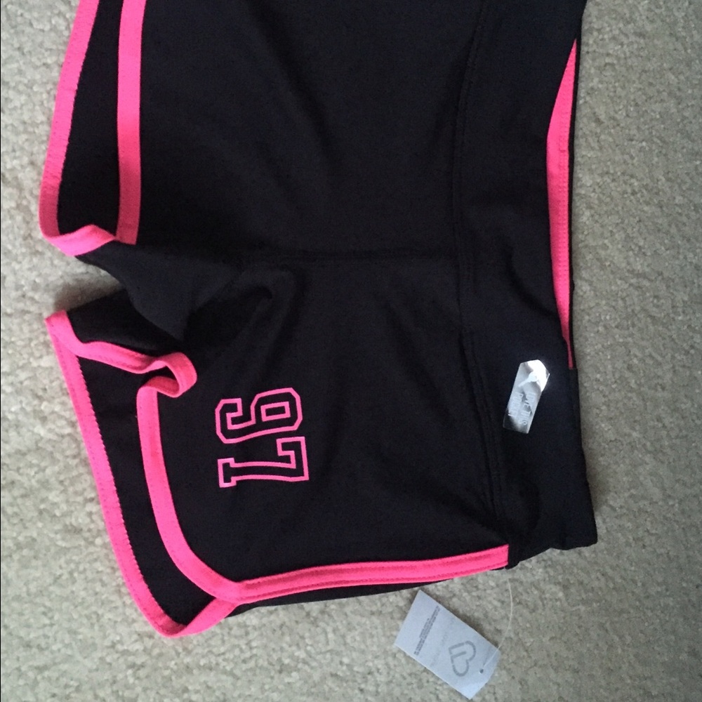 Black and pink spandex shorts