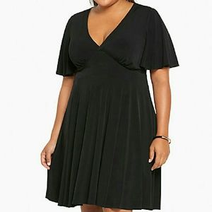 Black flutter dress.    (DS1)