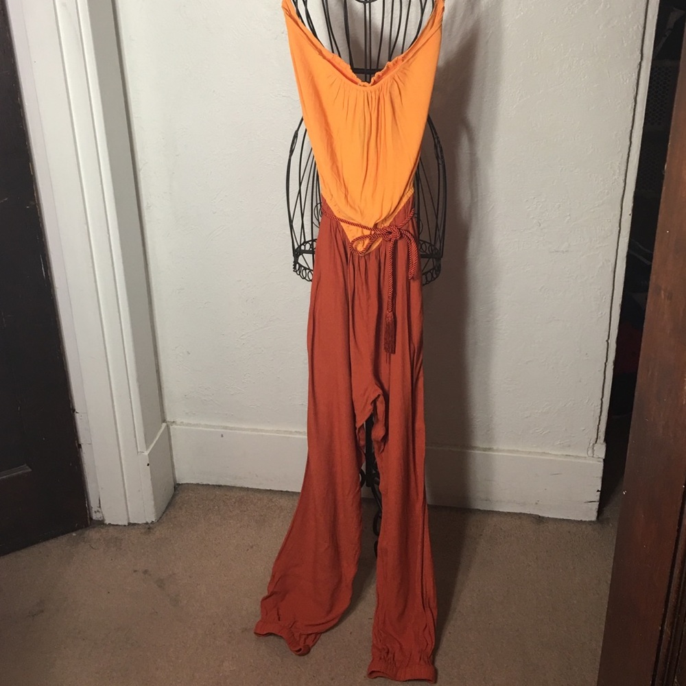 Tangerine and rust orange tube top jumpsuit.