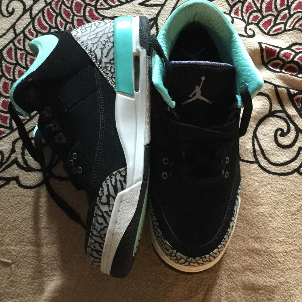 Air Jordan high tops black and turquoise