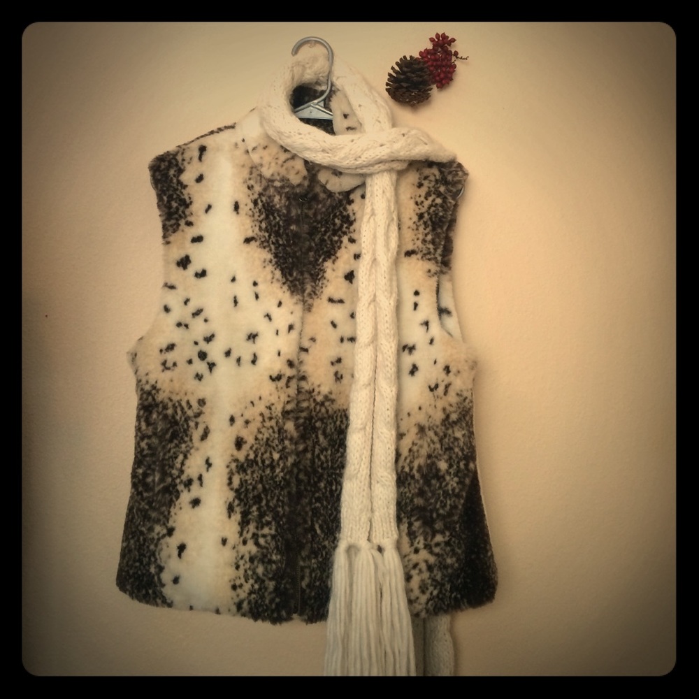 Four fur winter vest and paired scarf.