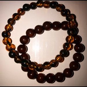 Two set of beaded bracelets.