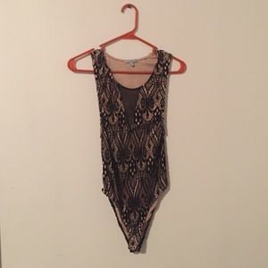 Black and Nude lace body suit