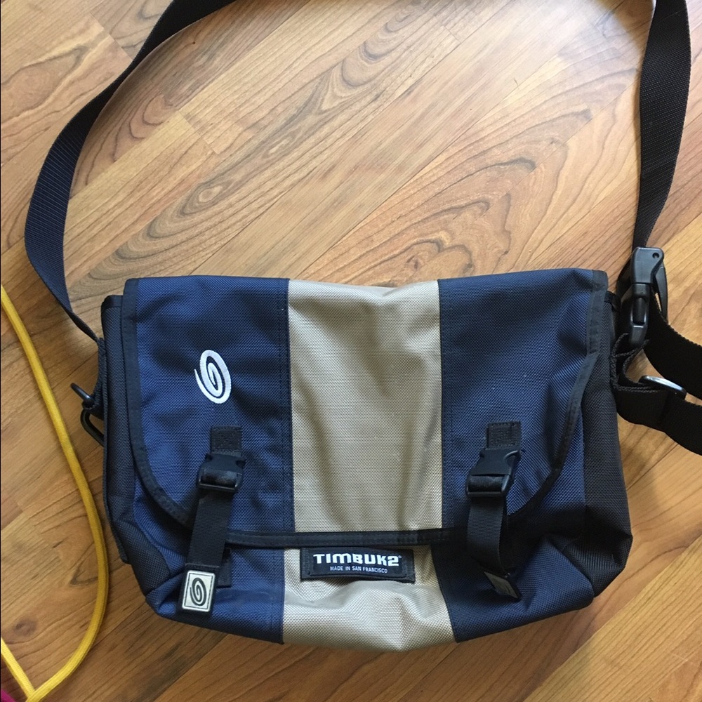 Timbuk2 blue and tan messenger bag.
