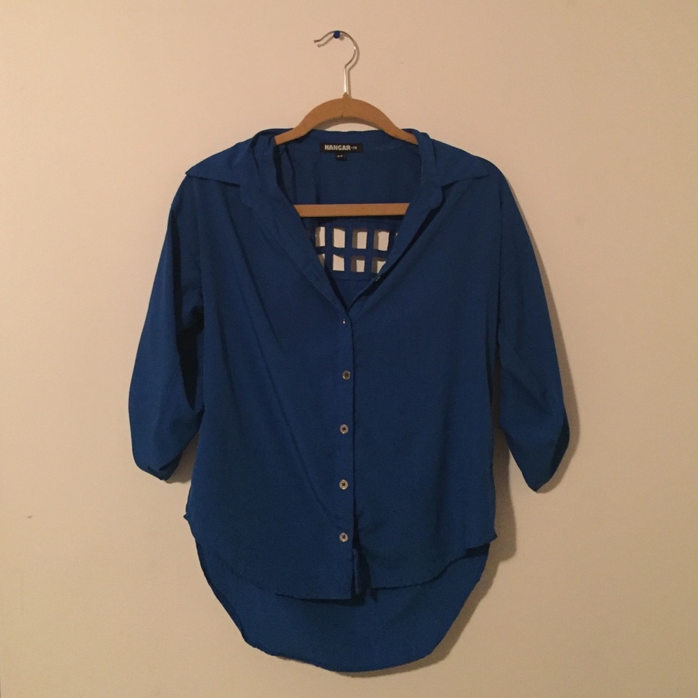 Blue button up blouse with cutouts on shoulders