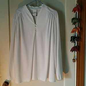 White blouse with pearl button front detail