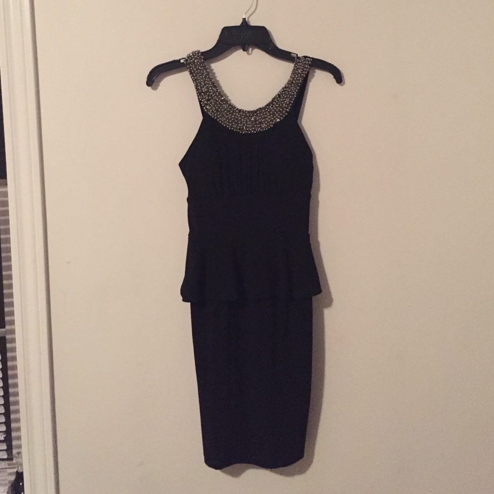 Knee length black cocktail dress w jewels on neck
