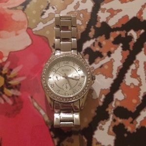 XOXO silver tone watch with bling