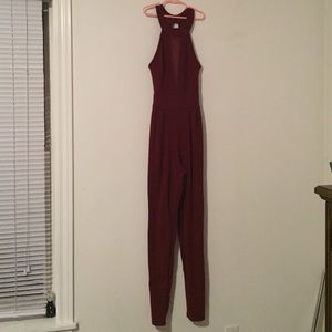 Maroon jumpsuit with mesh cutout in chest