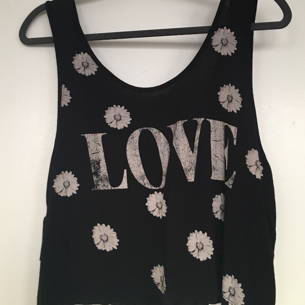 Fun and flirty love tank with ruffle detail