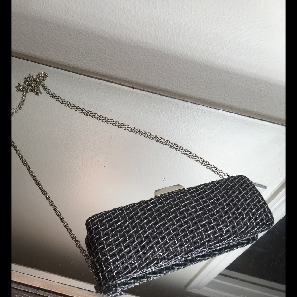 NWOT Black and silver clutch purse with silver