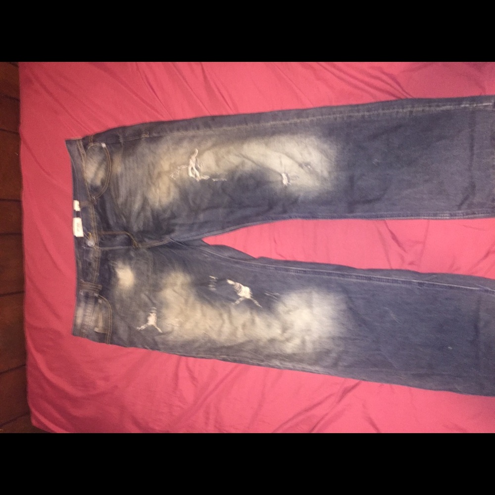 STONEWASHED RIPPED JEANS