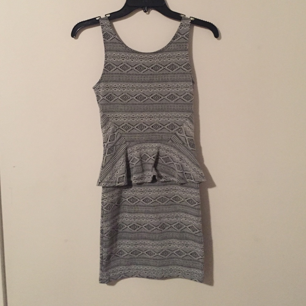 Black and white geometric peplum bodycon dress